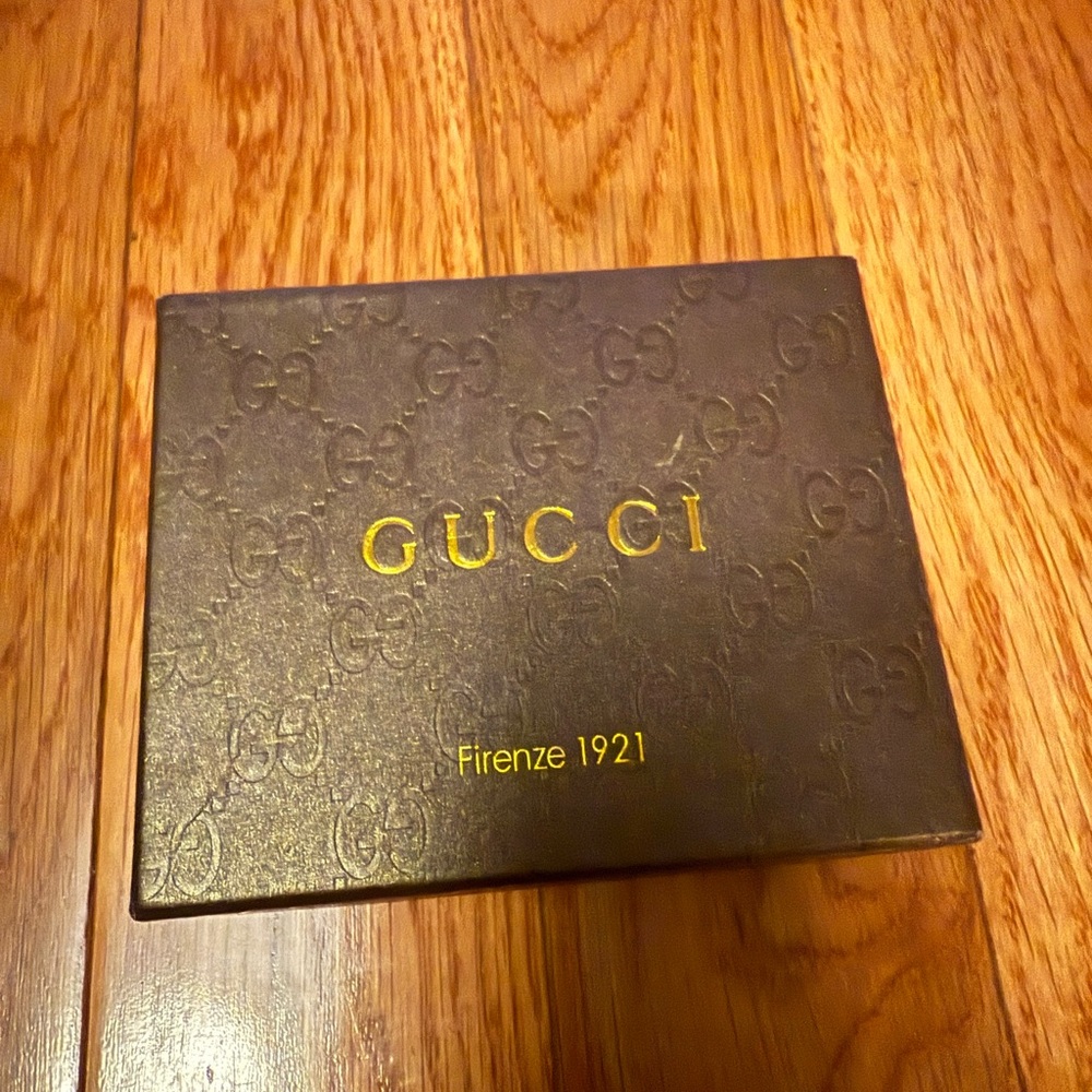 Gucci Dark Brown Embossed Box with Gold Accents.